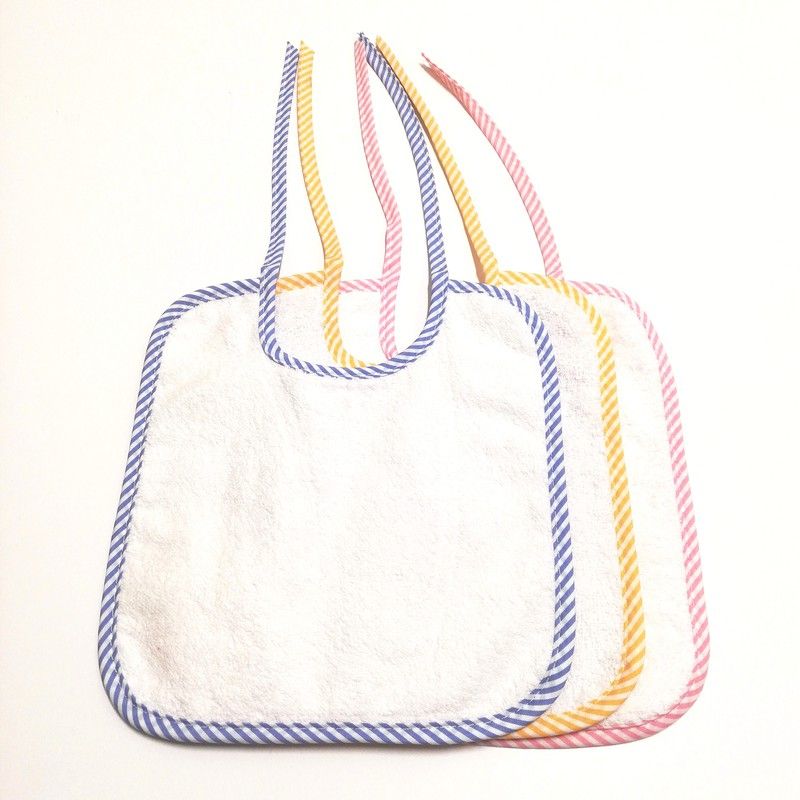 Pack 12 baberos de rizo con tira 23x26 cm 8001