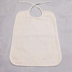 Pack 12 baberos de rizo con tira y plastificado 30x40 cm 8003