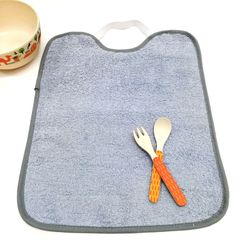 Pack 6 baberos de rizo con goma y impermeable 30x40 cm 104190
