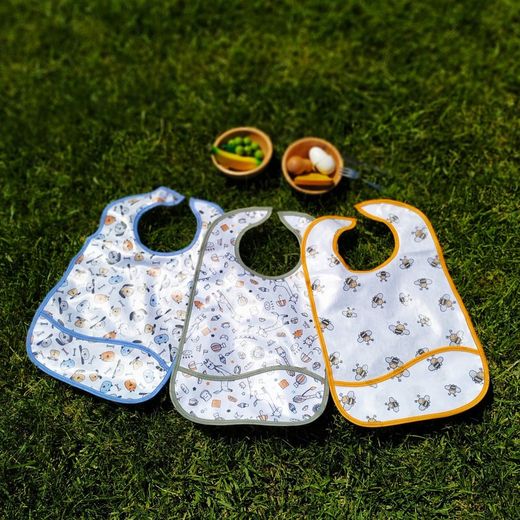 Pack de 3 unidades babero plástico impermeable con velcro 38x26 cm